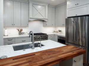 Image of kitchen with wood countertop.