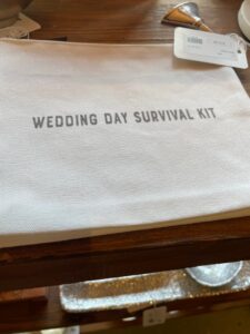 An image featuring a tan wedding day survival kit.